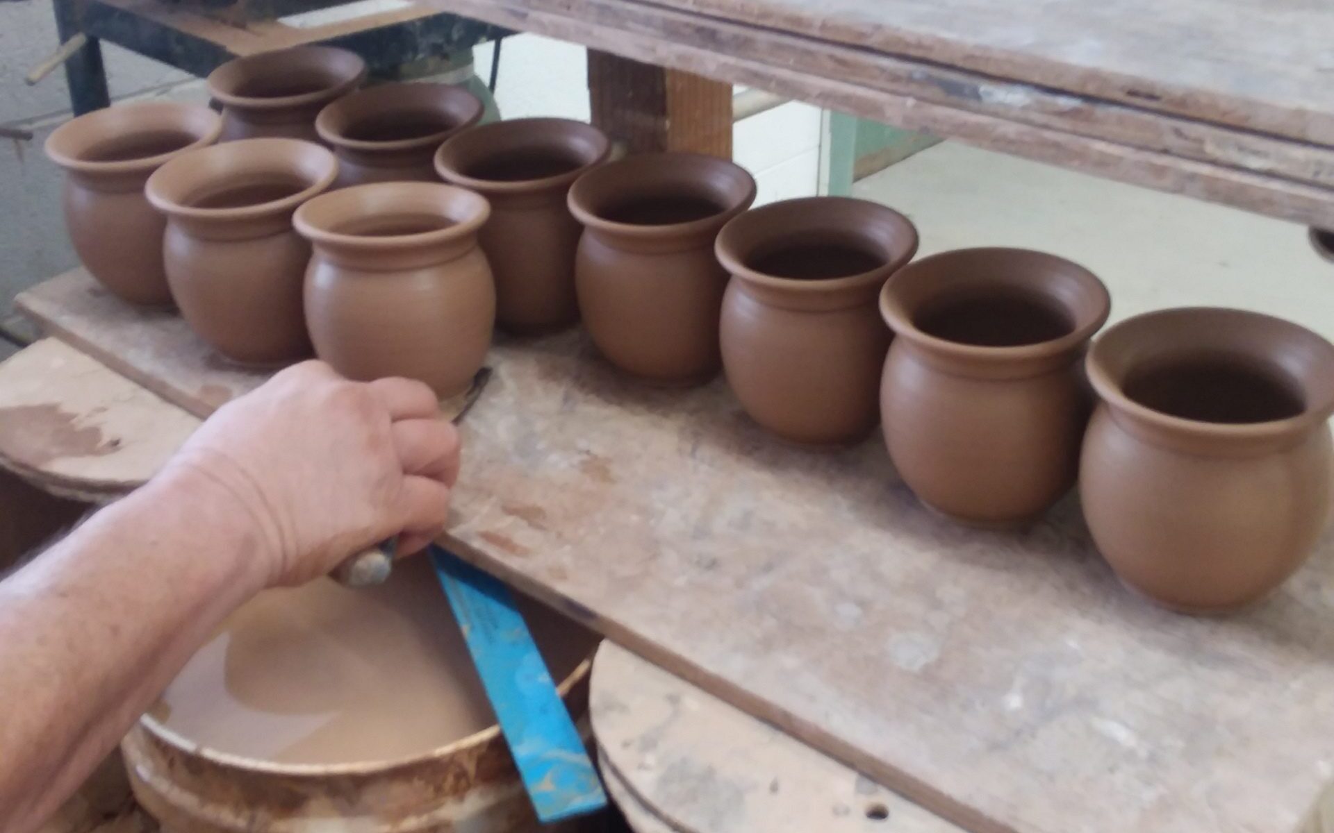 WorkingOnLittlePots_throwing